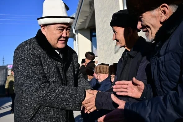 Kamchybek Tashiev helped a village mullah complete a house in the Suzak district