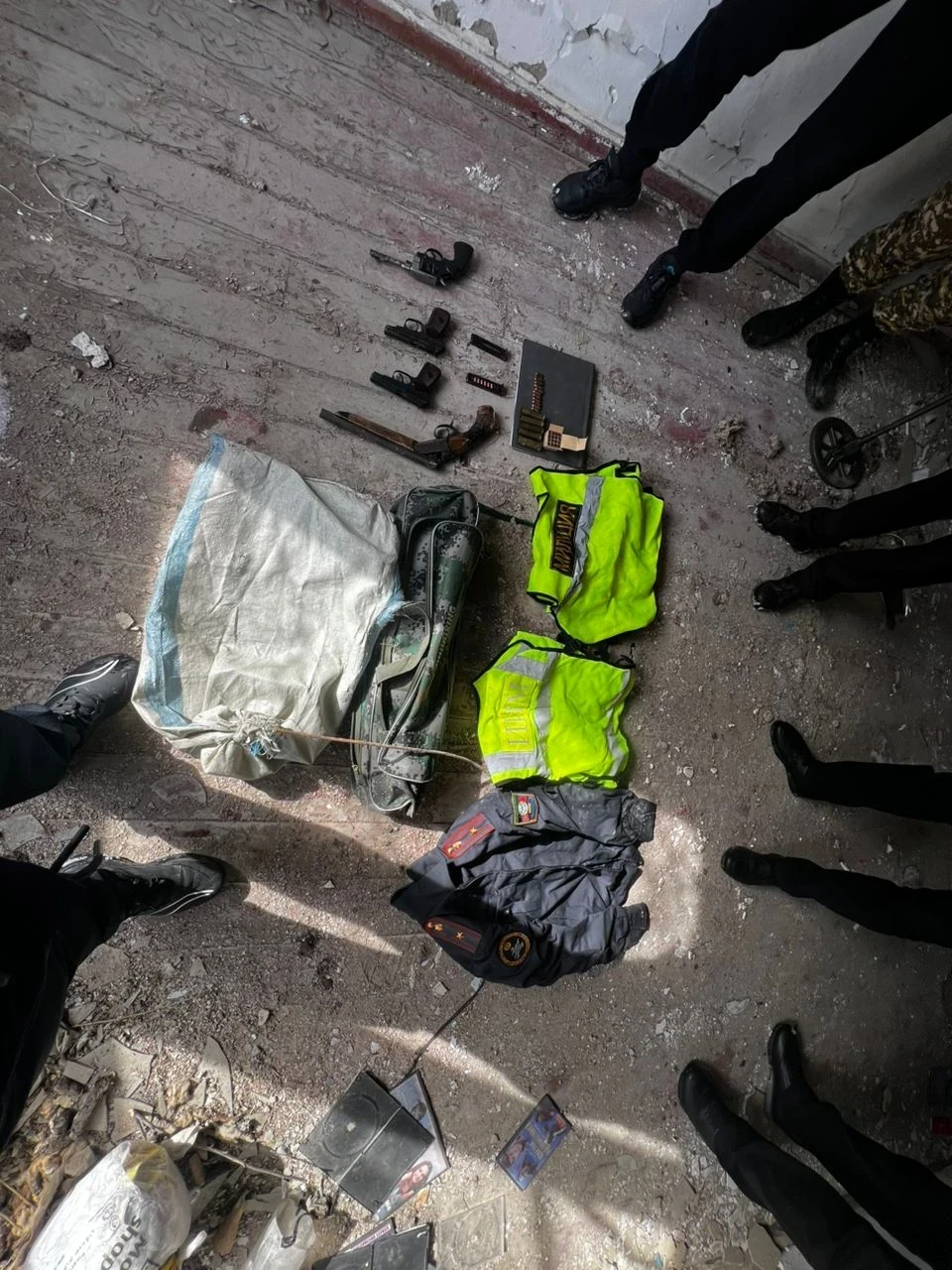 A stash of firearms and police uniforms was discovered in Karakol