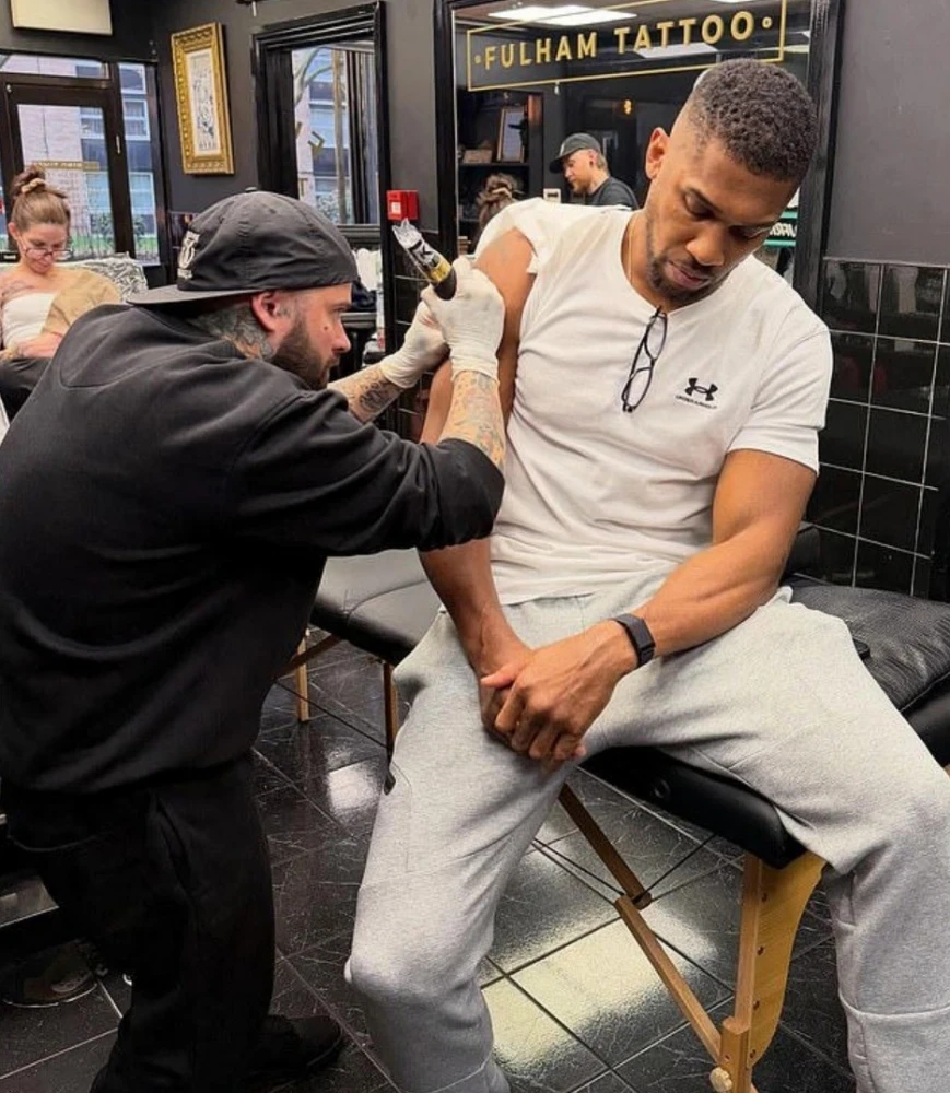 Anthony Joshua dedicated a tattoo in memory of friends who died in an accident