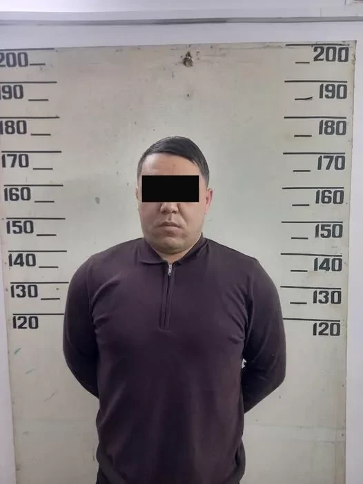 One of the group of fake police officers detained in Osh. They extorted money from the owners of a massage parlor.