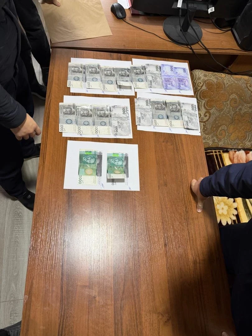 Таласта пара талап кылуу шектүү милиция кызматкери кармалды